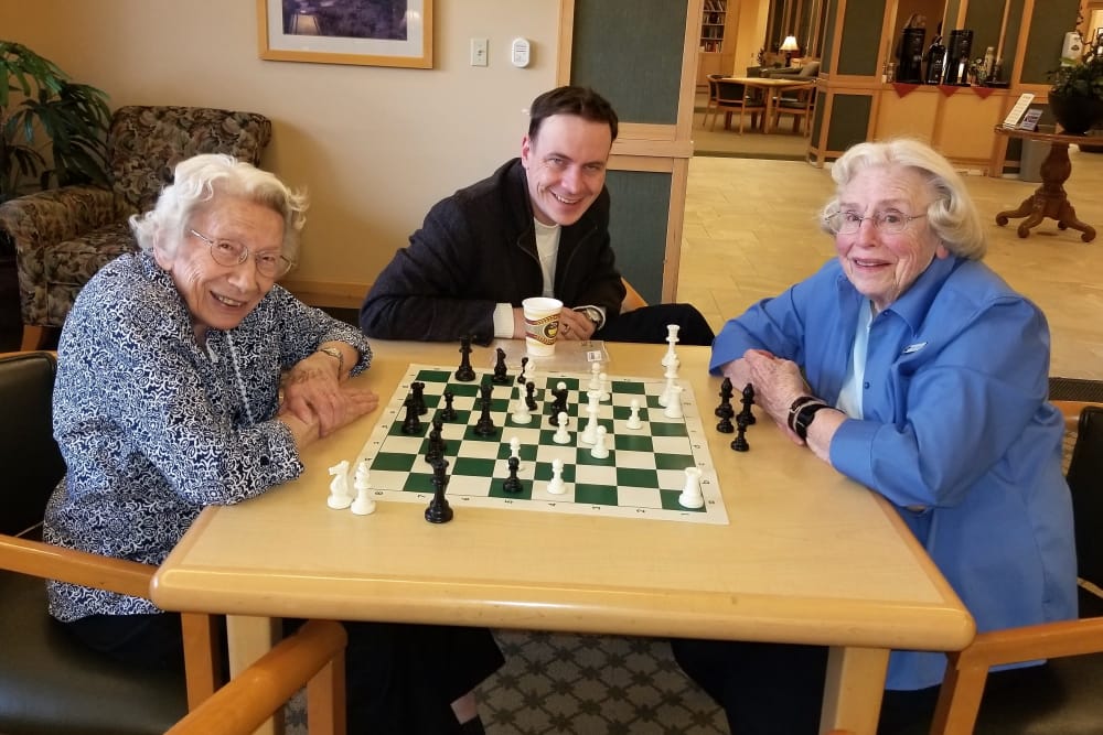 Residents playing chess at Merrill Gardens at Renton Centre in Renton, Washington. 