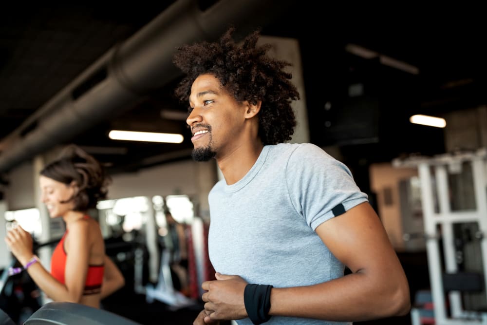 Resident gym with individual workout stations at Meridian Watermark in North Chesterfield, Virginia