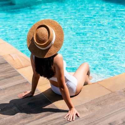 Resident by pool at The Beacon in Fremont, California