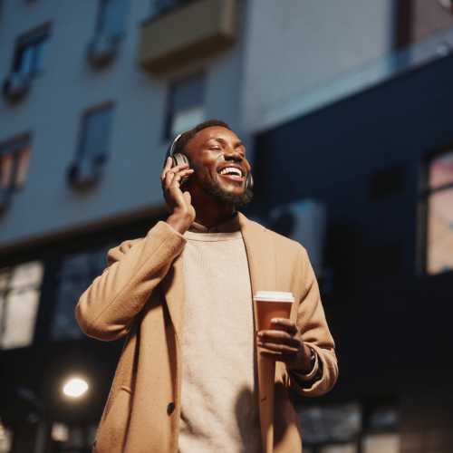 Resident talking on the mobile at Stoney Run Townhomes in Columbia, Maryland