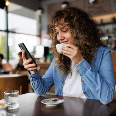 Woman having coffee near Quail Run in Middleton, Wisconsin