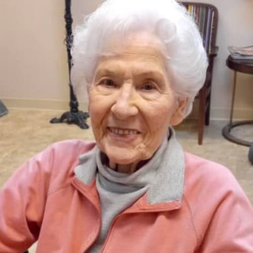 Resident holding a handmade halloween decoration at The Oxford Grand Assisted Living & Memory Care in McKinney, Texas