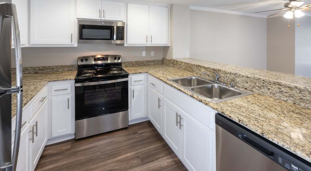 Kitchen with dishwasher at Bella Vista Apartments in Santa Clara, California