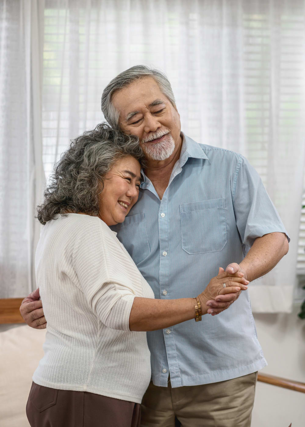 A resident couple dancing at The Landing a Senior Living Community in Roseburg, Oregon. 