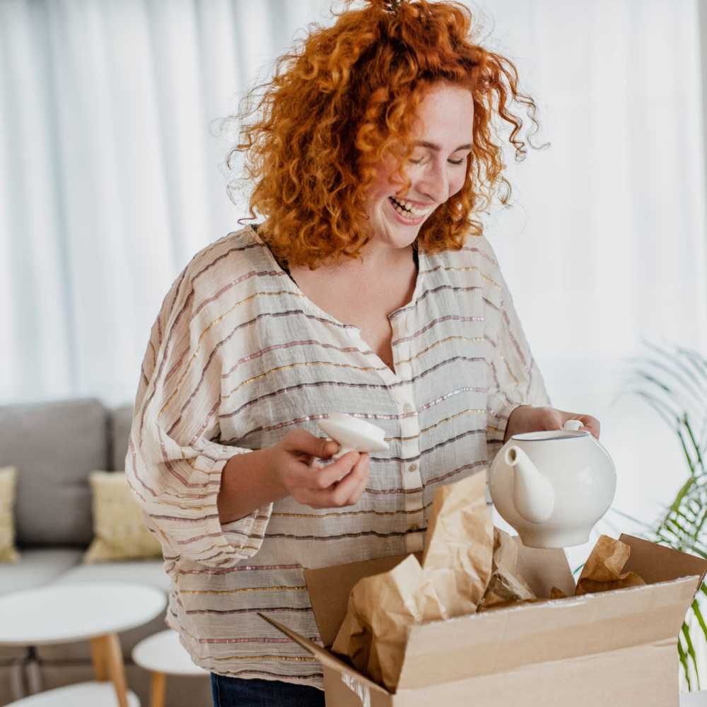 Resident unpacking the package at Oceana Apartments in Huntington Beach, California