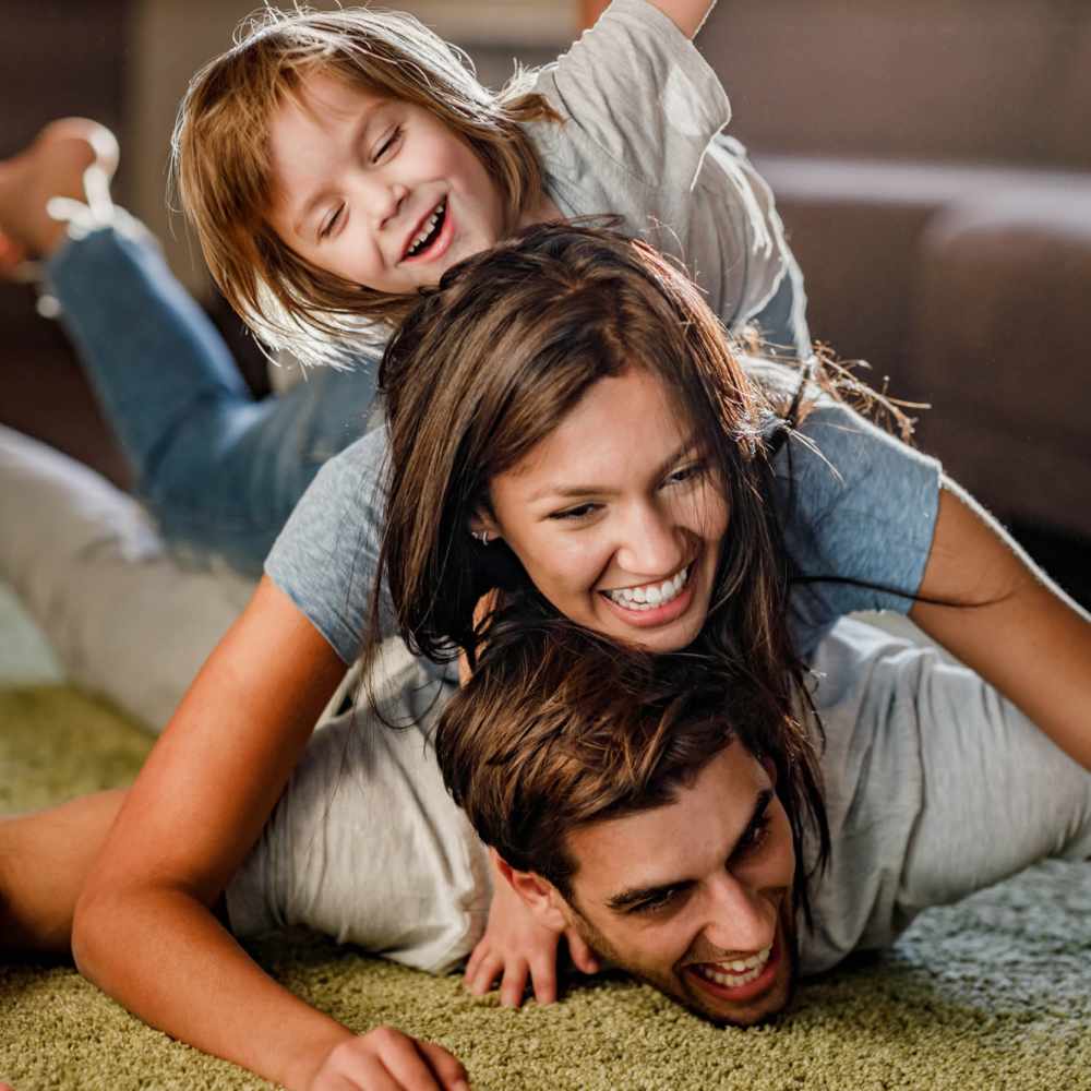 Resident family in their new apartment at El Paisano in Laredo, Texas