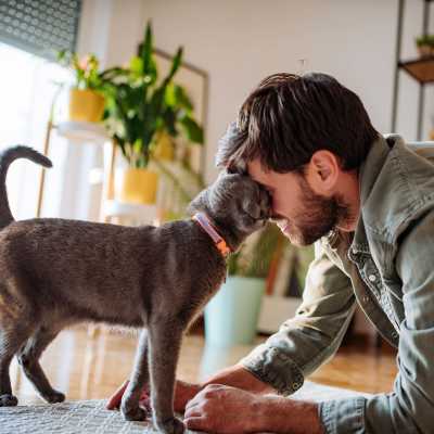 Resident with his cat at Sand Pebble and Spanish Oaks in Sparks, Nevada