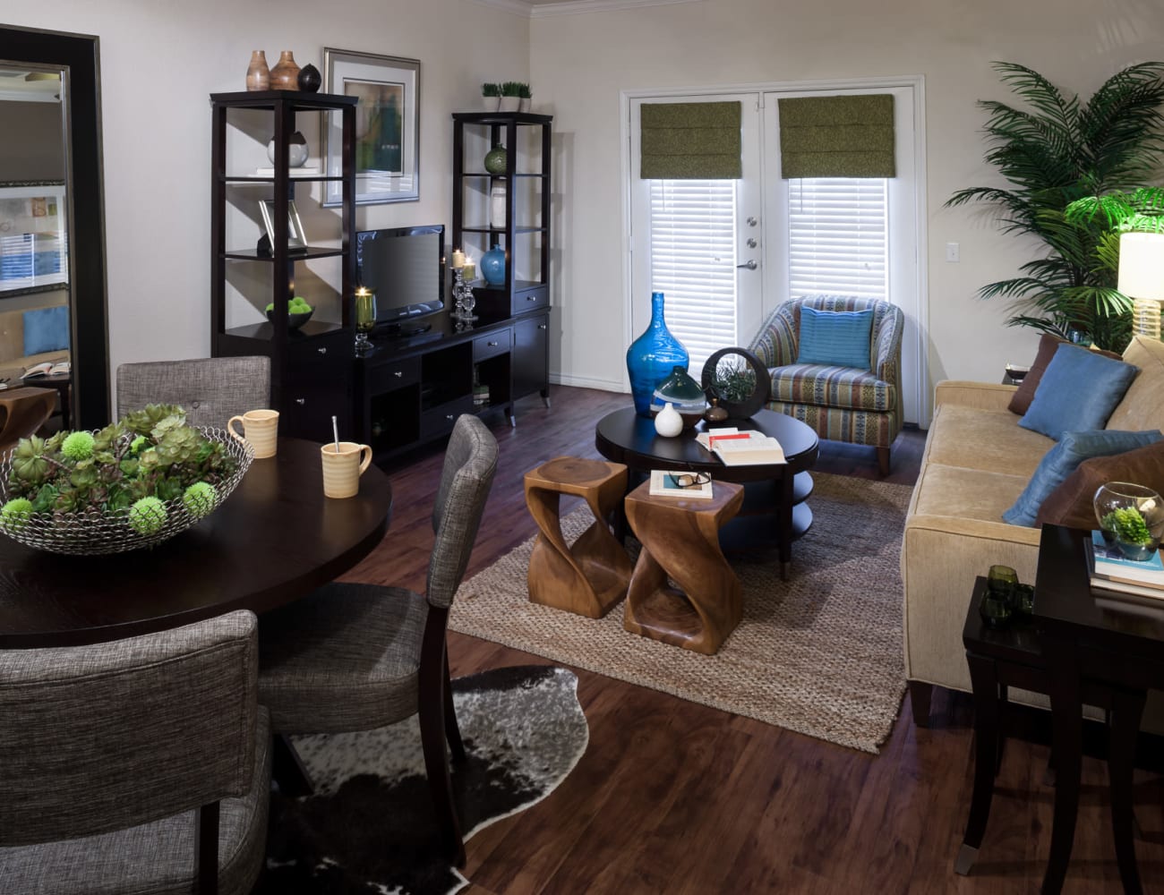 Open-concept layout with hardwood floors at The Asten at Ribelin Ranch in Austin, Texas