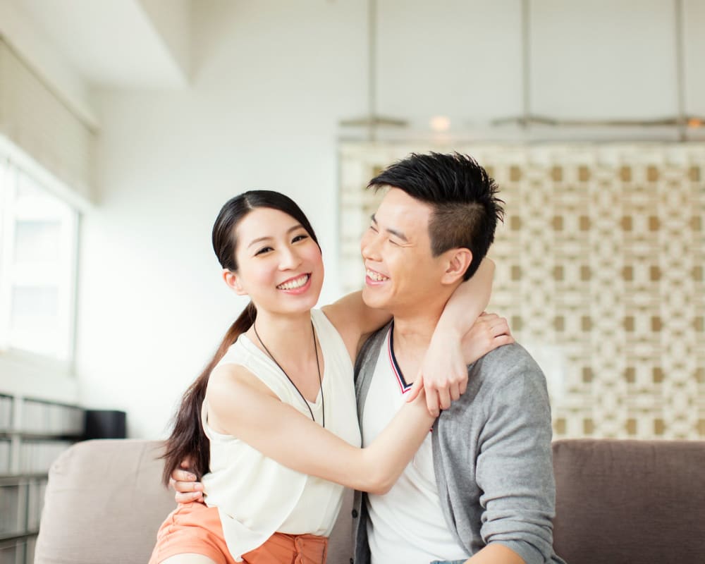 Happy couple at Eagle Pointe Apartment Homes in New London, Connecticut