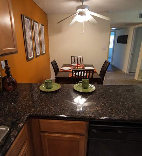 Apartment kitchen at Villas At Camino Bernardo in San Diego, California