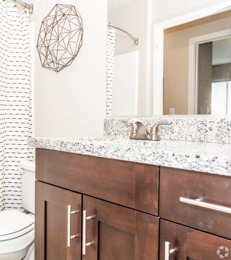 Bathroom with vanity mirror at Hidden Creek in Vacaville, California