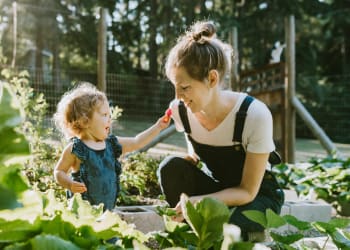 Mother and daughter in a garden near Wolf Ridge in Stayton, Oregon