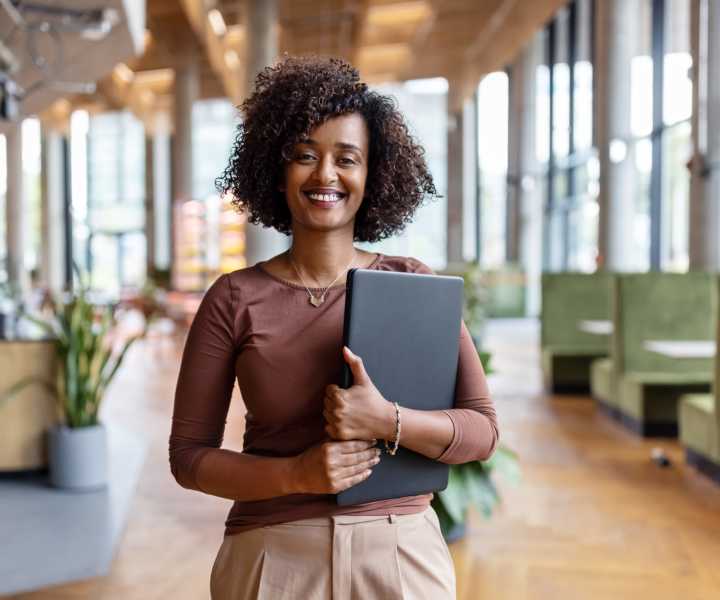 Woman working in a modern office space near Cascade Ridge in Madras, Oregon