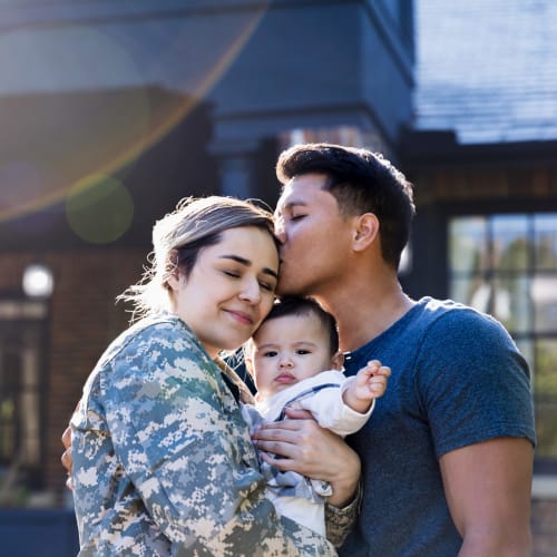 A family gathering outside at Madigan in Joint Base Lewis McChord, Washington