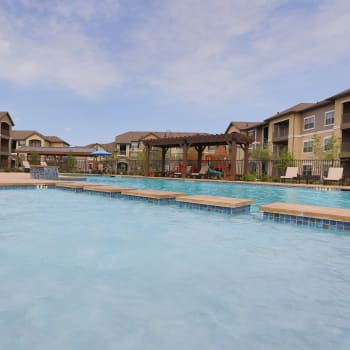The welcoming community swimming pool at Cypress Creek Joshua Station in Joshua, Texas