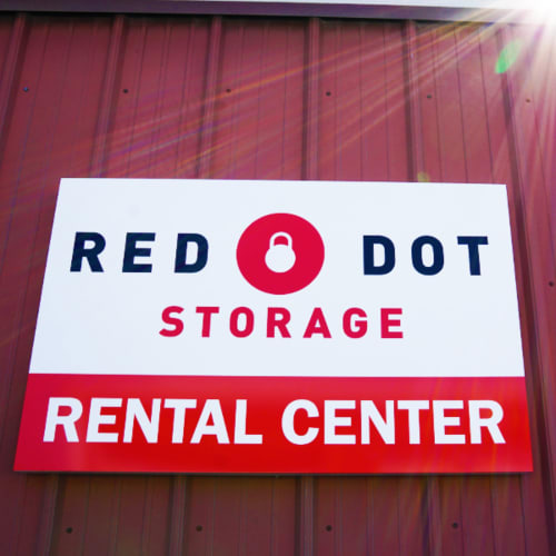 Sign for the rental center at Red Dot Storage in New Lenox, Illinois