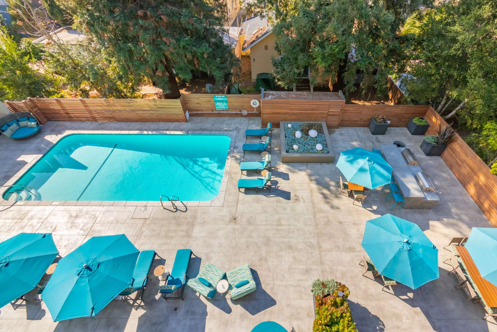 Apartments with a community swimming pool and pool side seating