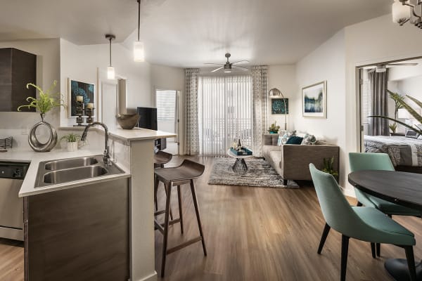 Beautiful open-concept layout with hardwood floors in a model home at Park Place at Fountain Hills in Fountain Hills, Arizona