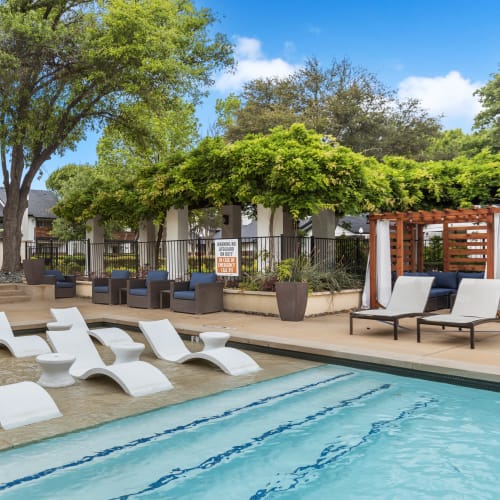 The community swimming pool at Villas at Chase Oaks from Villas at Chase Oaks Apartment Homes in Plano, TX