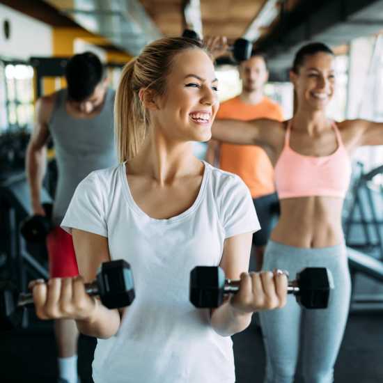 Residents lifting weight at East National Flats in Milwaukee, Wisconsin