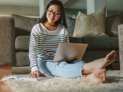 Resident studying on her ground at Broadway Towers in Concord, California