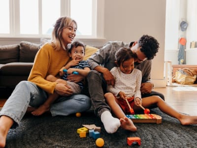 Family playing at Sequoyah Apartments in Concord, California