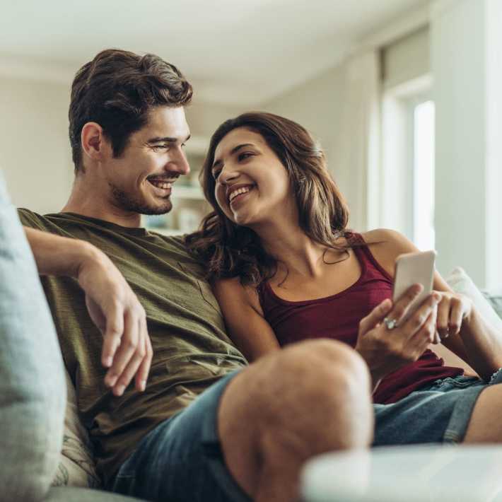 A happy couple in their apartment at Elevations One, Woodbridge, Virginia
