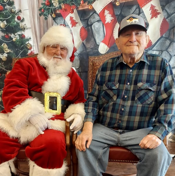 A River Park (TX) resident enjoys his time with Santa