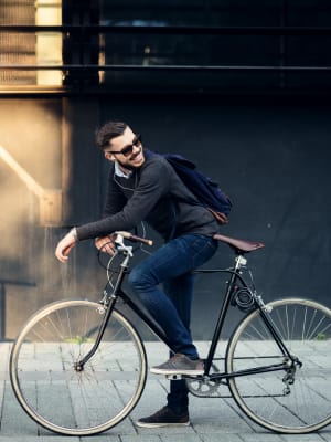 A man biking to work from his apartment at Kestrel Park in Vancouver, Washington