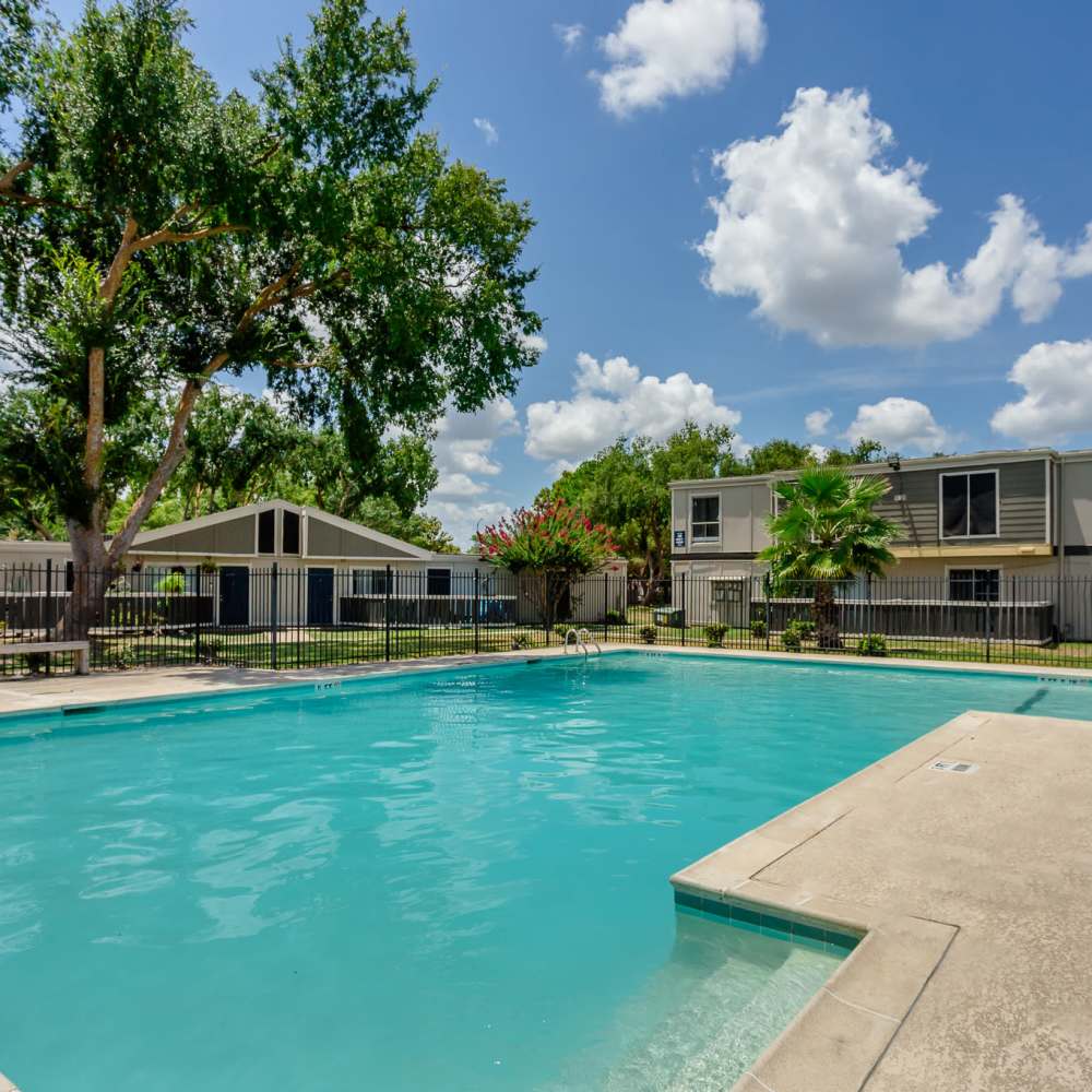 Living space with large windows at Huntington Village And Cambridge Crossing in Houston, Texas