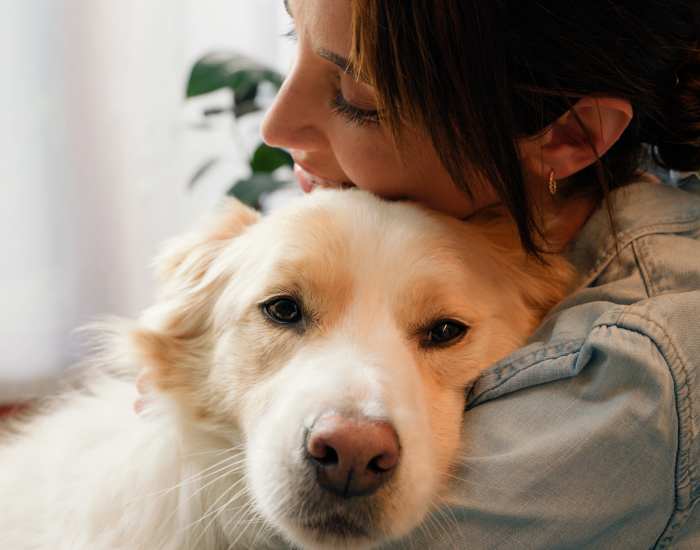 Resident along with her pet at Chatham Grove Apartments in Chicago, Illinois