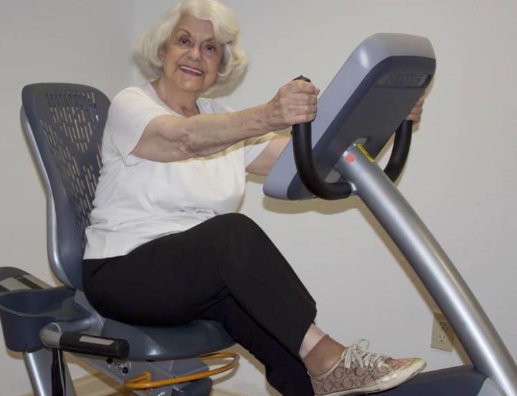 Senior enjoying her workout at The Commons at Woodland Hills in Woodland Hills, California