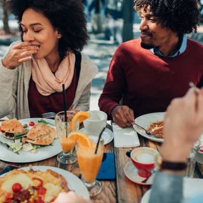 Couple having food, in a restaurant near Century Park Place, Morrisville, North Carolina
