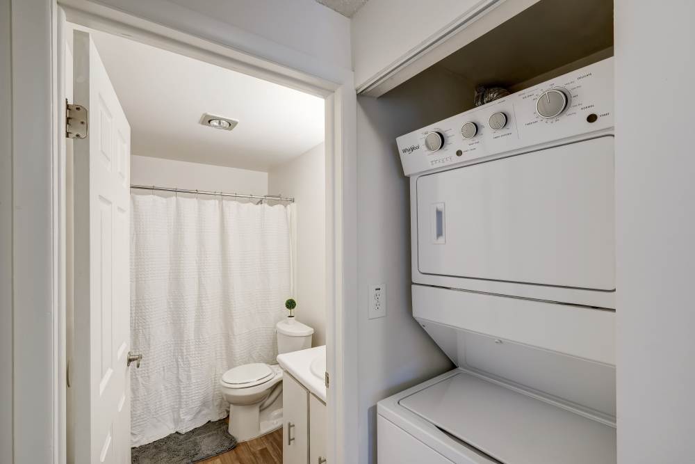 Bathroom and in-unit stacked laundry