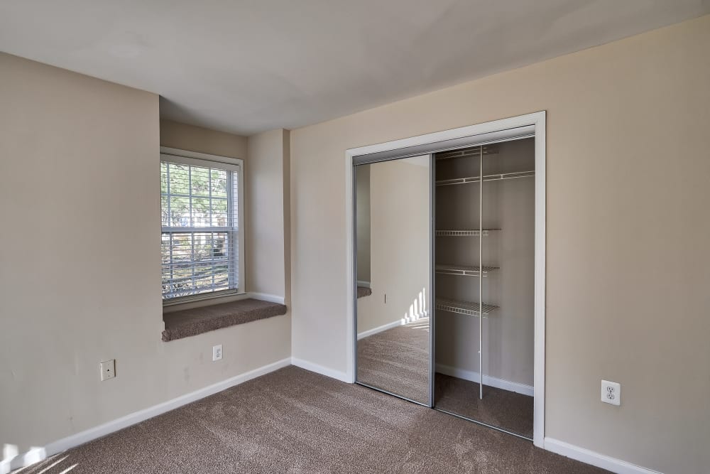 Bedroom with built in window seat at Abbotts Run Apartments in Alexandria, Virginia