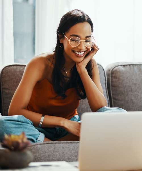 Resident on her laptop at Granite Creek in Rocklin, California