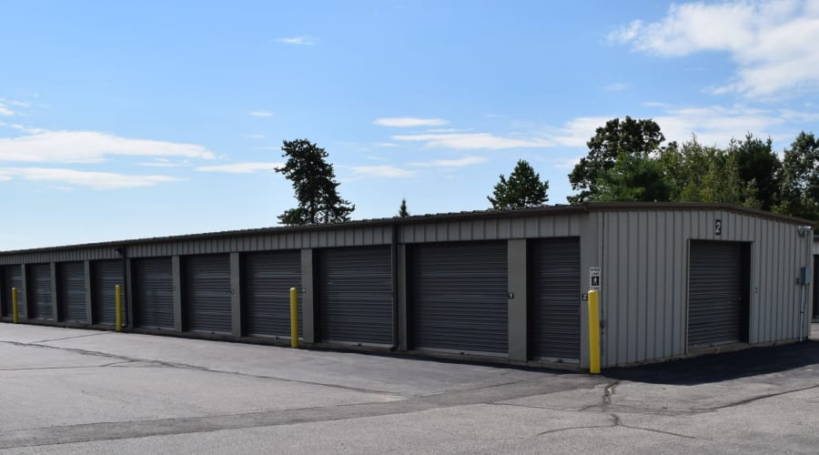 Storage units with blue doors and locks at KO Storage of Sanford in Sanford, Maine