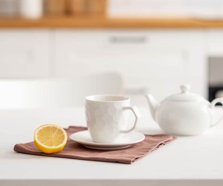 Charming kitchen with white appliances and countertops at Camas Meadows in Beaverton, Oregon