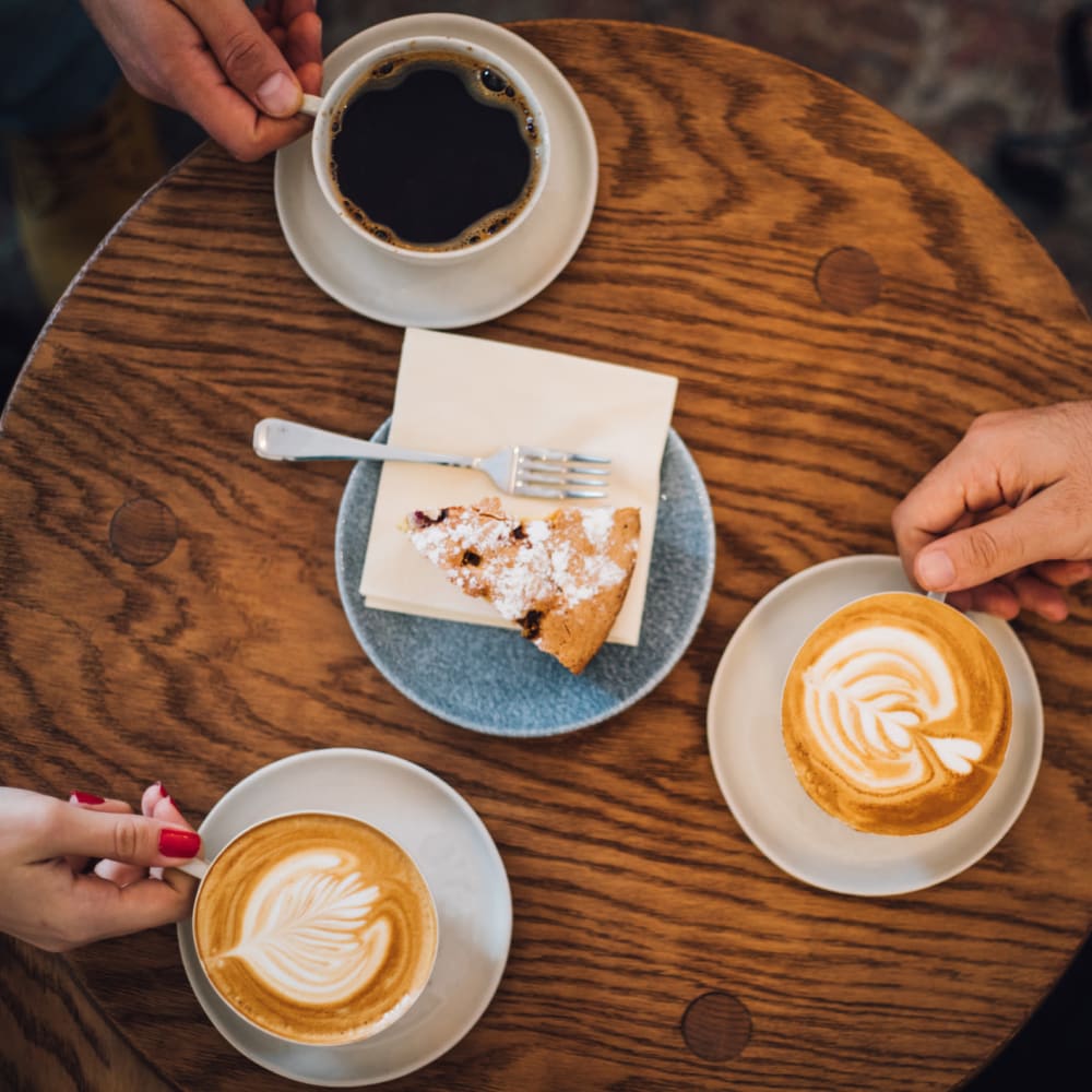 Residents drinking coffee at Flower Mound Assisted Living in Flower Mound, Texas