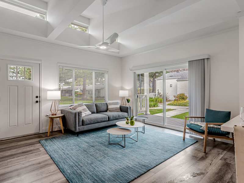 Spacious living room with a couch at Capitola Gardens in Capitola, California