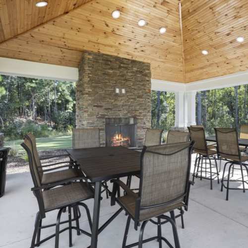 Patio area with fireplace and lots of seating at Hudson at Carolina Colours in New Bern, North Carolina