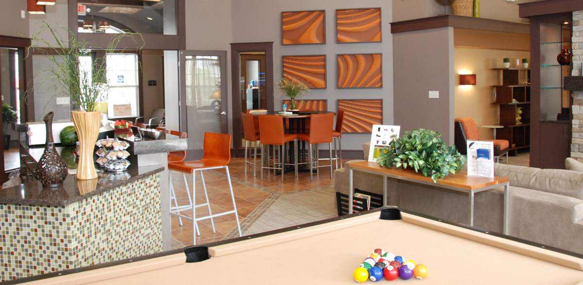 Cozy clubhouse lounge area with billiard pool table at The Cascades, Virginia Beach, Virginia