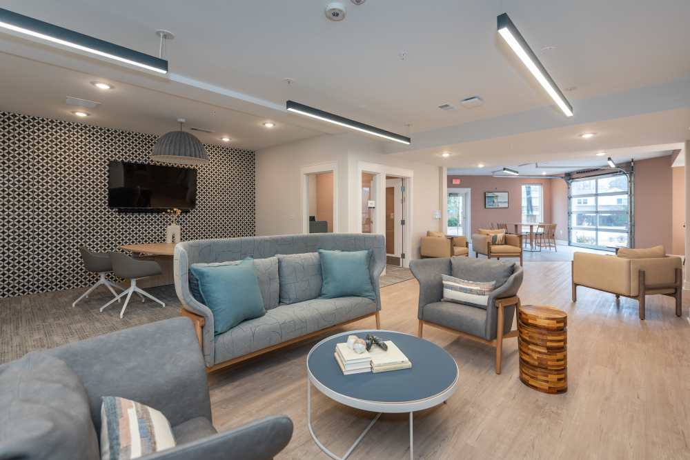 Spacious modern style living room at Attain at Chic’s Beach, Virginia Beach, Virginia