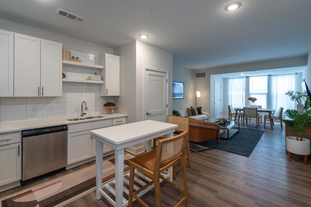 Modern style kitchen and dining area at Attain at Chic’s Beach, Virginia Beach, Virginia