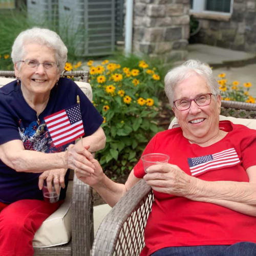 Residents hanging outside at Oxford Villa Active Senior Apartments in Wichita, Kansas