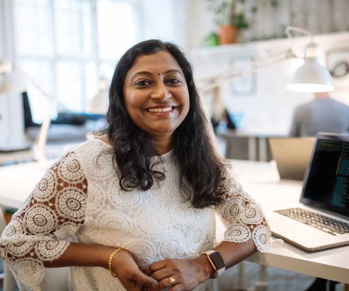 Resident working in a modern office space near White Oaks West in Gates, New York