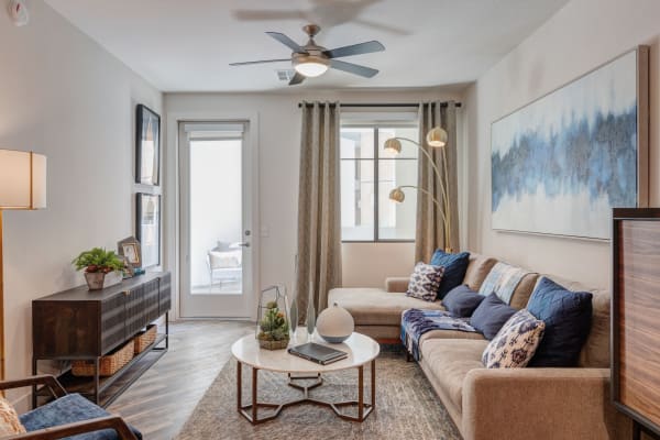 Spacious living room with very cool art and modern decor at The Scottsdale Grand in Scottsdale, Arizona