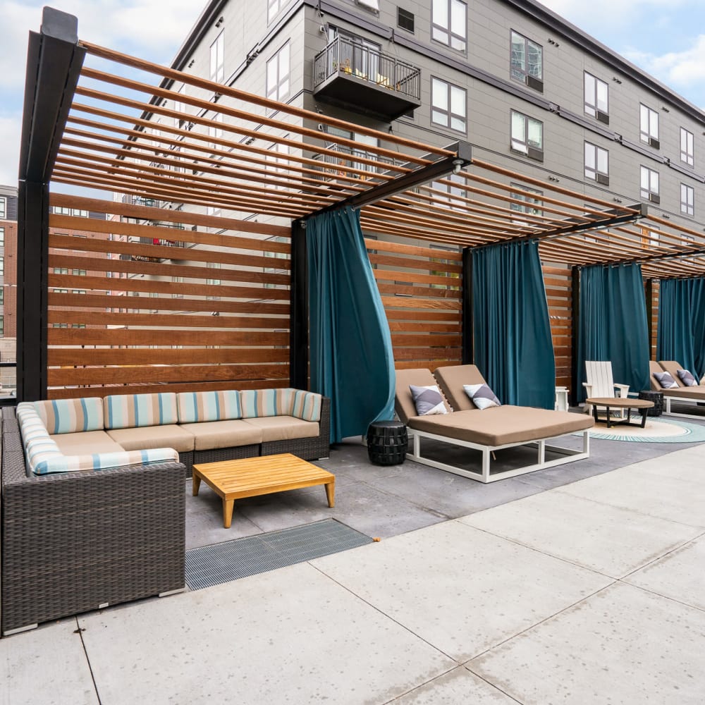 Private cabanas next to the pool at Marquee Living in Minneapolis, Minnesota