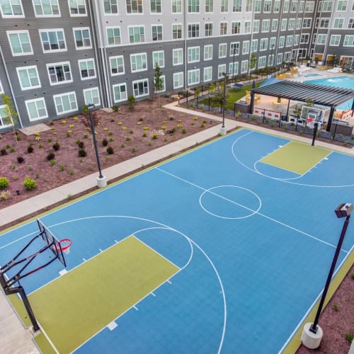 The community basketball court at The Banks Student Living in Coralville, Iowa