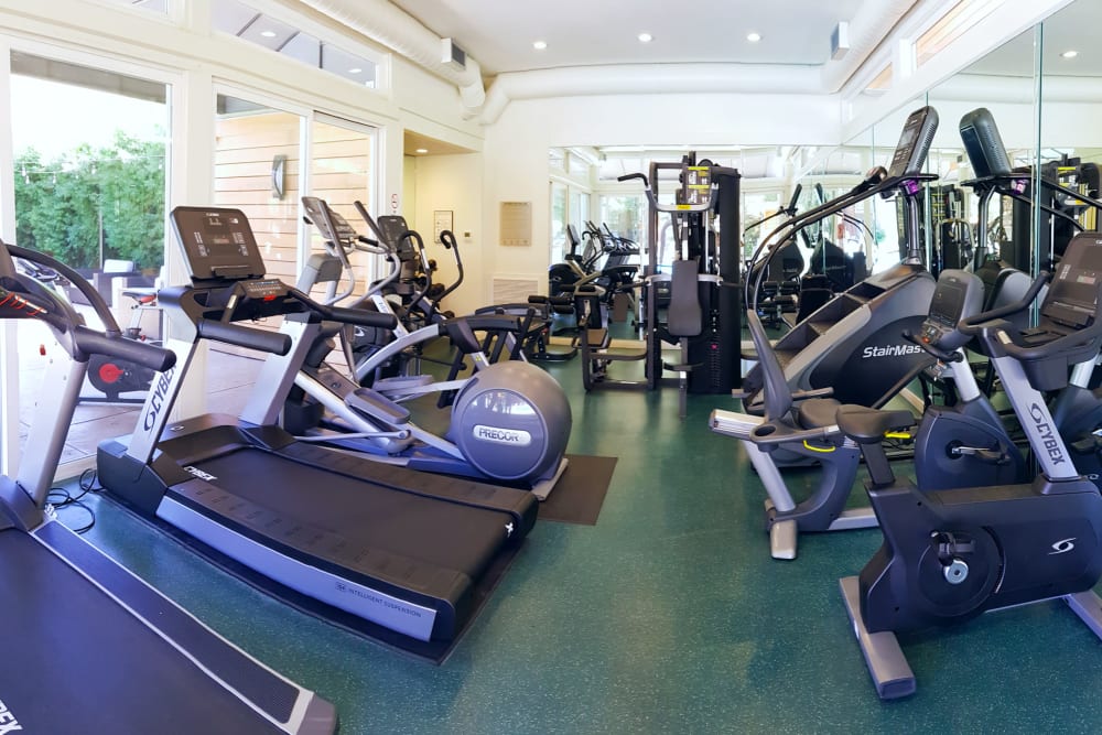 Fully equipped fitness center at Brookdale Apartments in San Jose, California